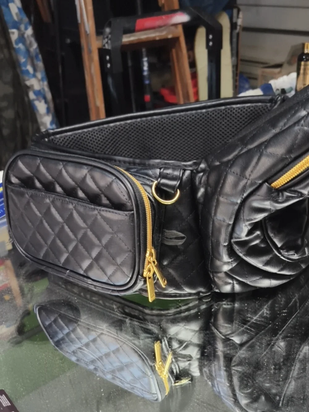 a MINT Tushbaby Quilted Vegan Black Leather Bag. Excellent.